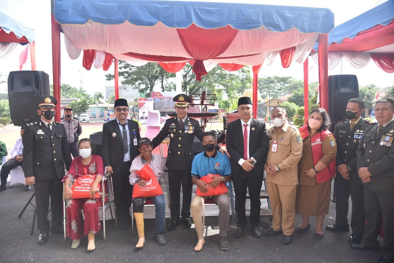 Hut Bhayangkara ke 76, Polres Bersama Pemkab Batu Bara Berikan Bantuan
