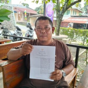 Bupati Simalungun Teken SK Pemberhentian Sementara Pangulu Purwodadi.